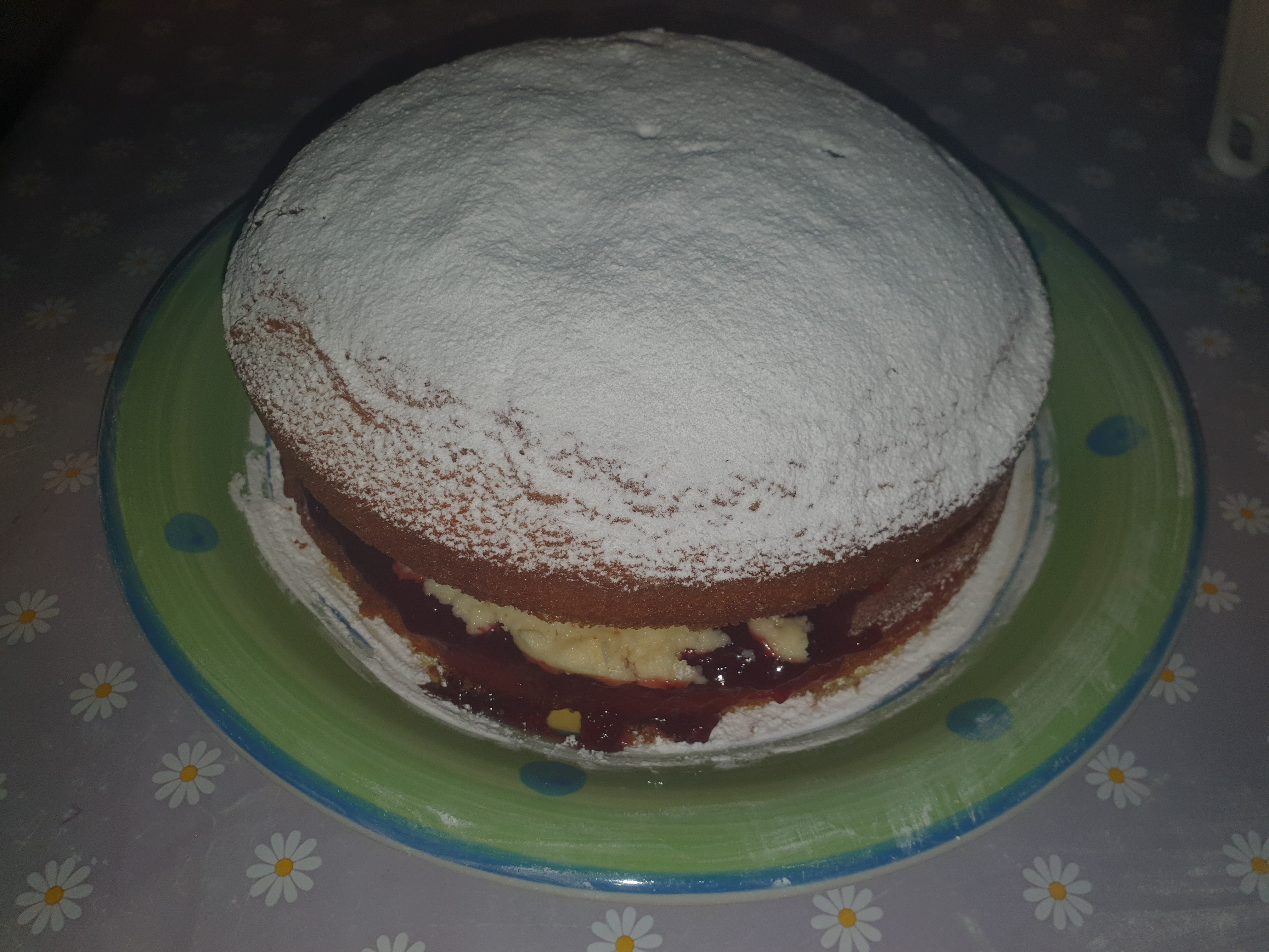 Vanilla Cake with Raspberry Jam and Buttercream Filling